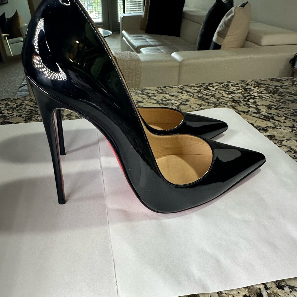 Christian Louboutin
So Kate Patent Pointed-Toe Red Sole Pump